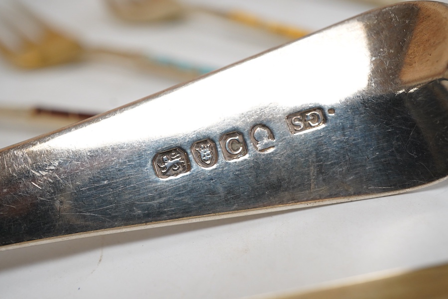 A modern silver gilt Amouage perfume bottle in the form of Oman Palace Ruwi mosque, maker possibly Asprey & Co, London, 1995, height 12.3cm, together with a George III silver Old English thread pattern basting spoon, by